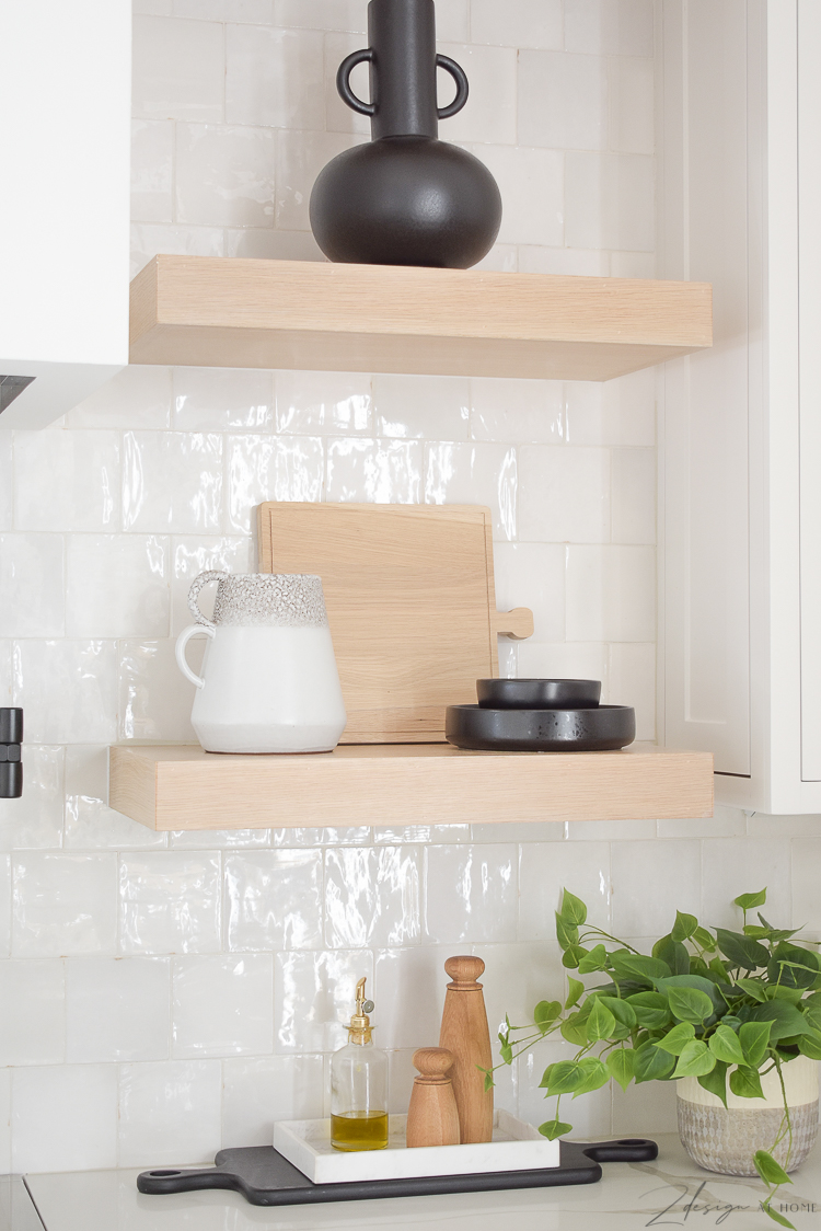 kitchen styling accessories, cutting board , black dishes 