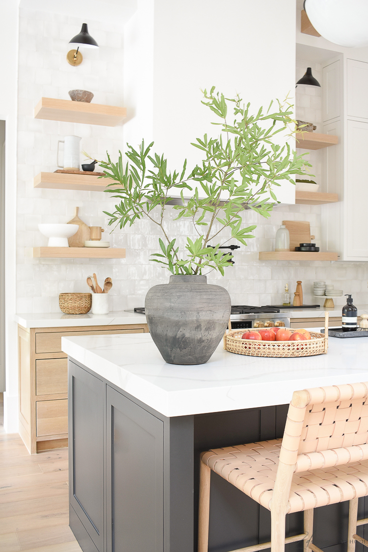 vintage inspired vase on modern kitchen counter top, white zellige tile