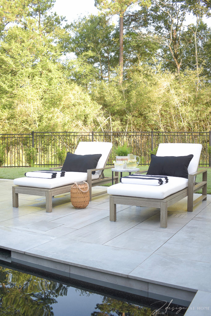 Summer Style on patio - loungers with black and white summer outdoor patio decor
