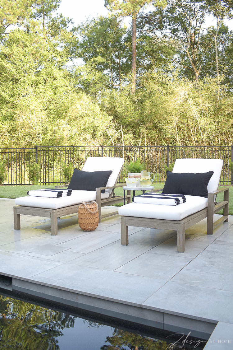 Summer Style on patio - loungers with black and white summer outdoor patio decor 