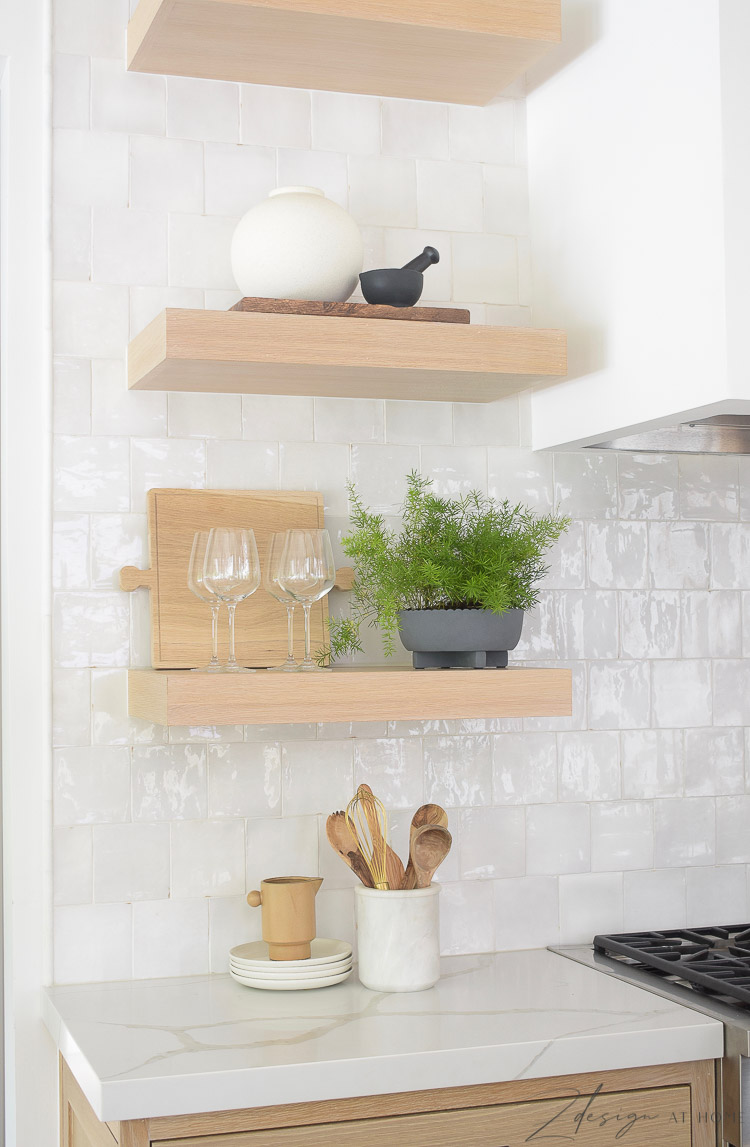 white oak open shelves in the kitchen with styled decor from walmart 