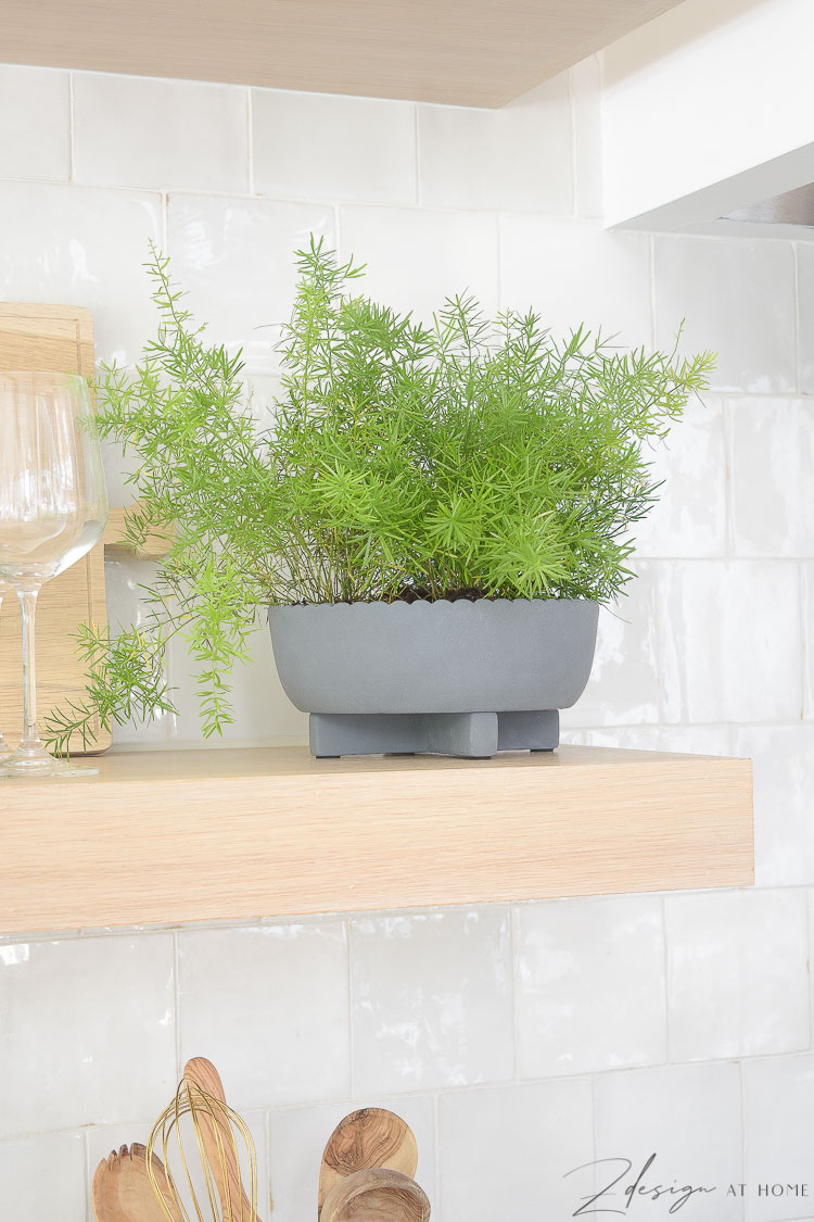 gray scalloped pot on open shelves in kitchen styled summer walmart decor 