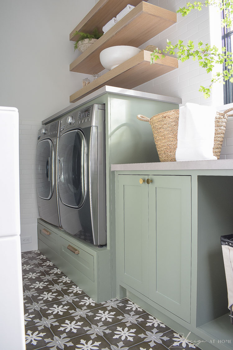 builtin washer and dryer and sw dried thyme paint color on cabinets 