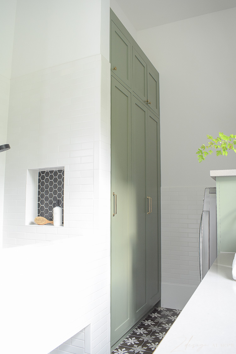 tall green gray cabinets in sw dried thyme in laundry room 