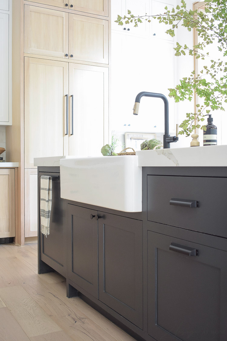 modern farmhouse kitchen with black white and white oak cabinets - blanco sink 