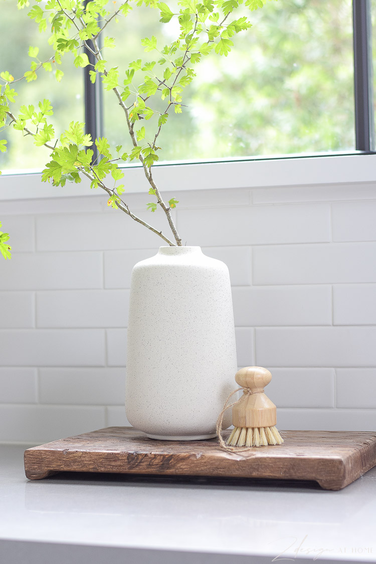 speckled vase in boho setting