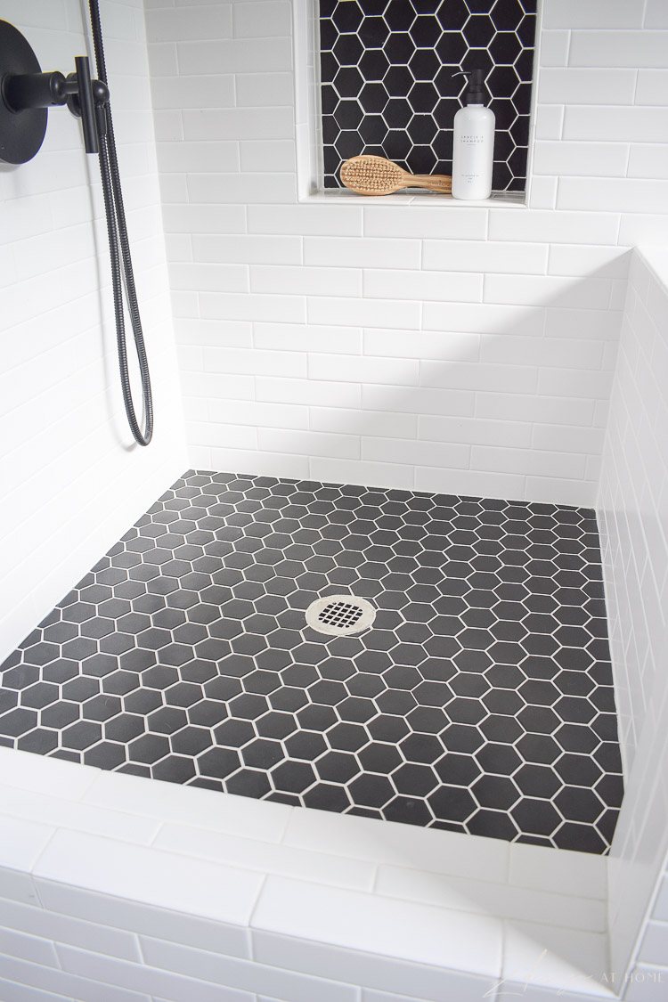 black hex shower / dog wash floor, with white grout 