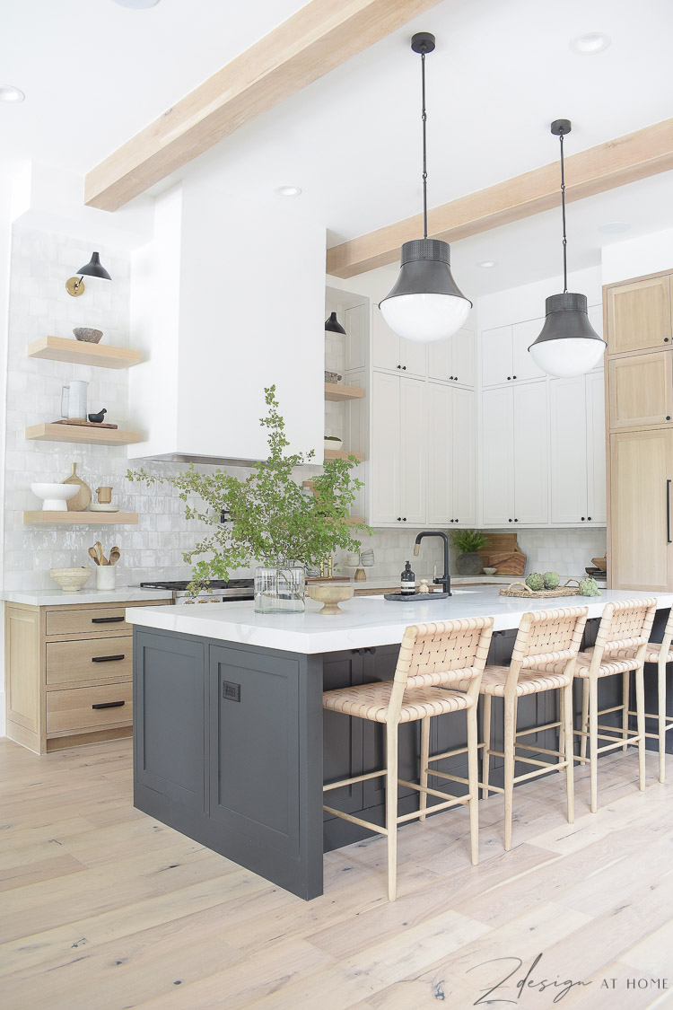 modern farmhouse kitchen with 3 cabinet colors - white oak, sw snowbound and black island