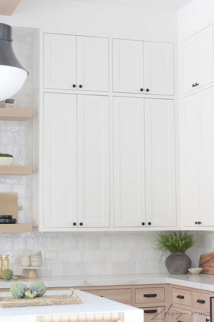 white cabinet uppers in sw snowbound in modern farmhouse kitchen