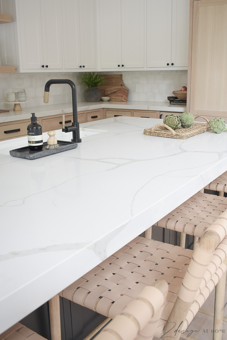 calafata nous quartz countertops in white with veining 