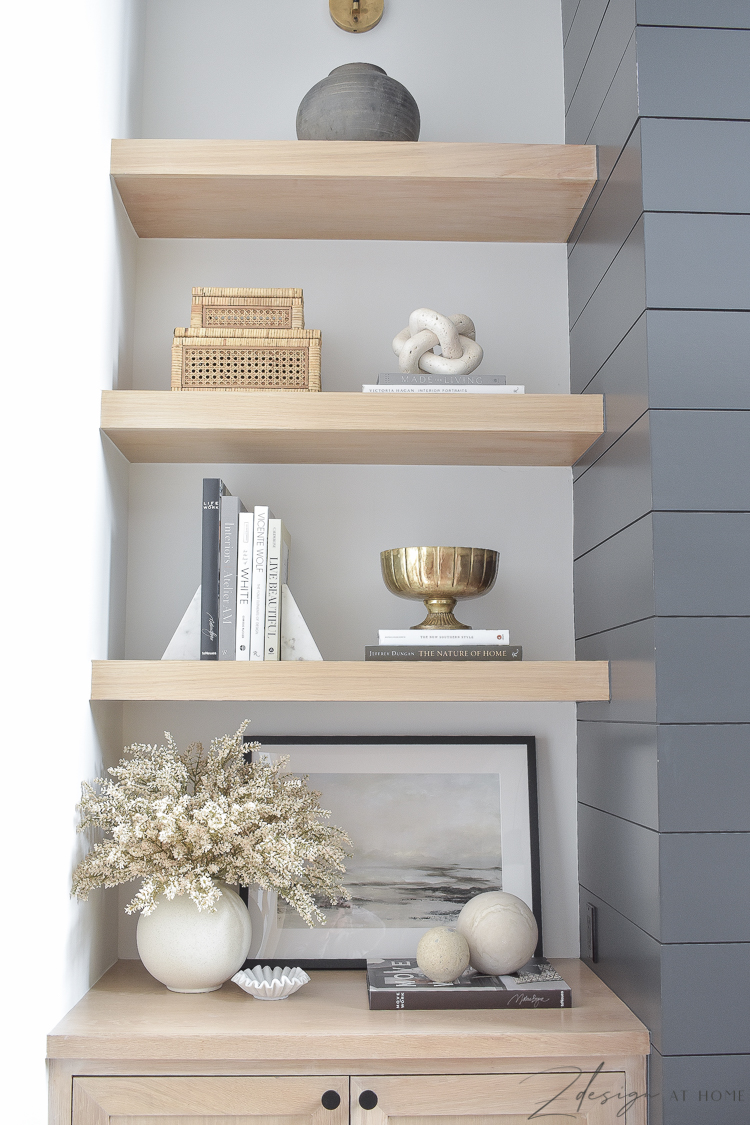 white oak shelves styled with neutral fall decor 