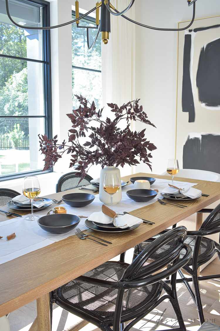 scandinavian inspired table scape with black dishes 
