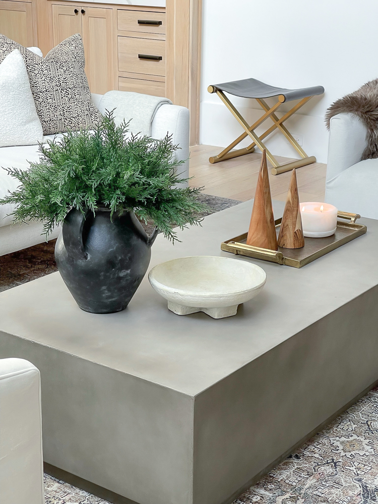 modern christmas decor styled on coffee table 