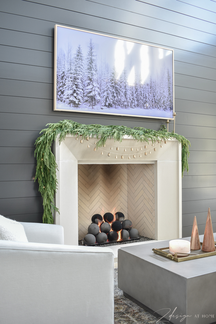 cast stone mantle isokern fireplace with black shiplap wall fireplace and concrete fireballs 