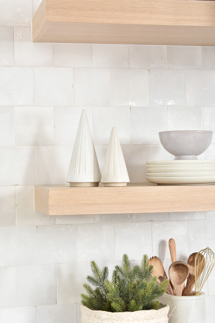 modern Christmas decor on open kitchen shelves 