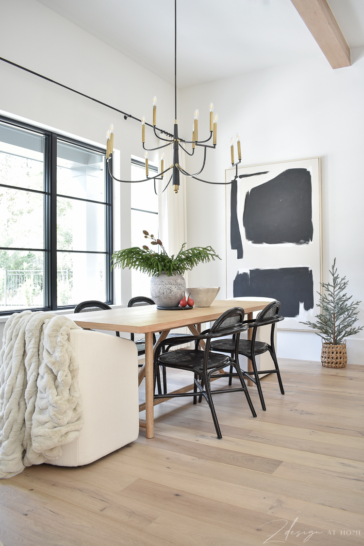 modern farmhouse dining room decorated for christmas 