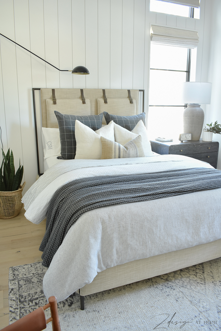 teenage boys bedroom with vertical shiplap walls 