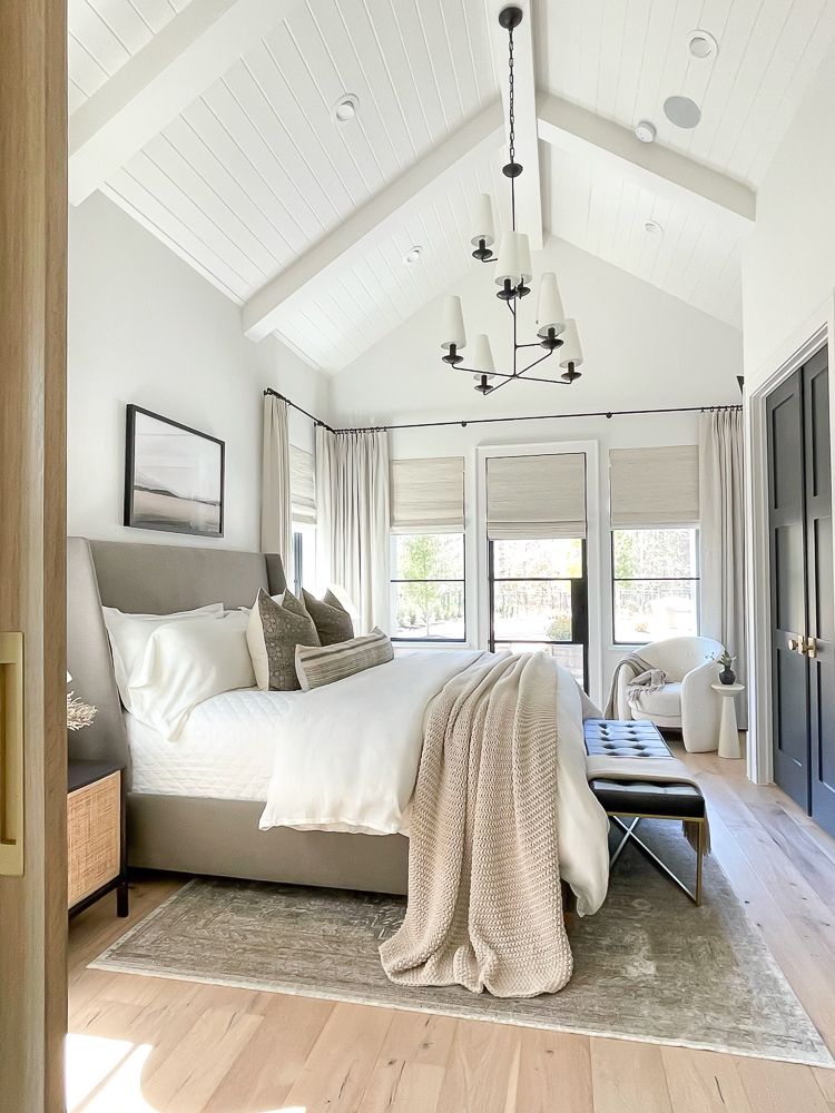 master bedroom with vaulted ceiling, tongue and groove and beams 