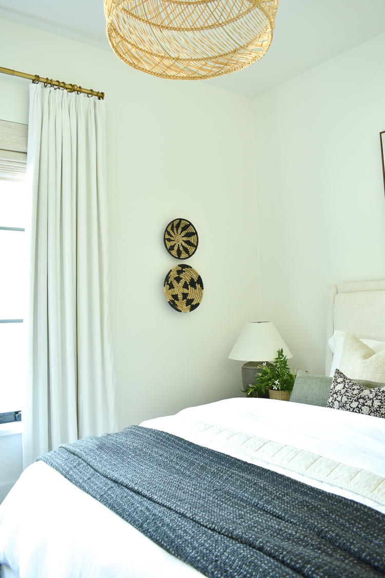 wall baskets in guest bedroom 