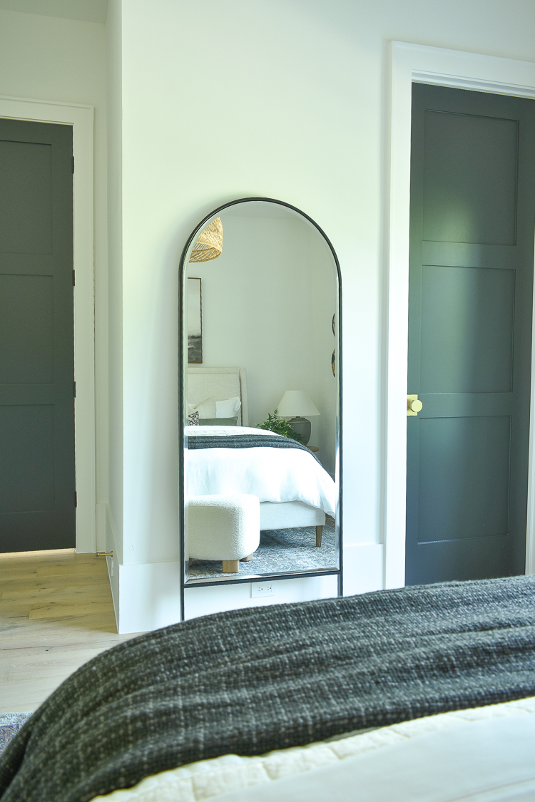 black arched floor mirror 