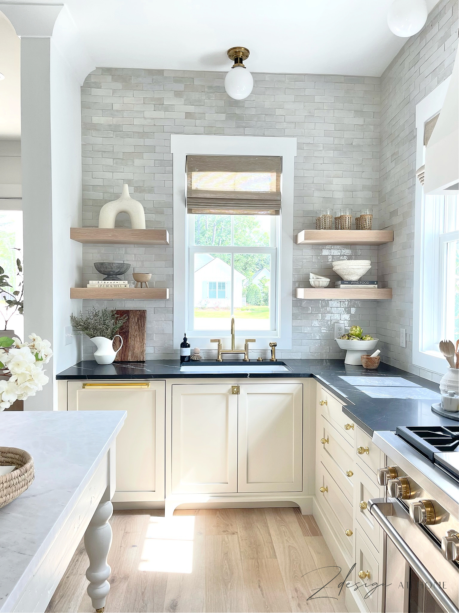 english inspired kitchen with unlaquered brass plumbing fixtures and open white oak shelves