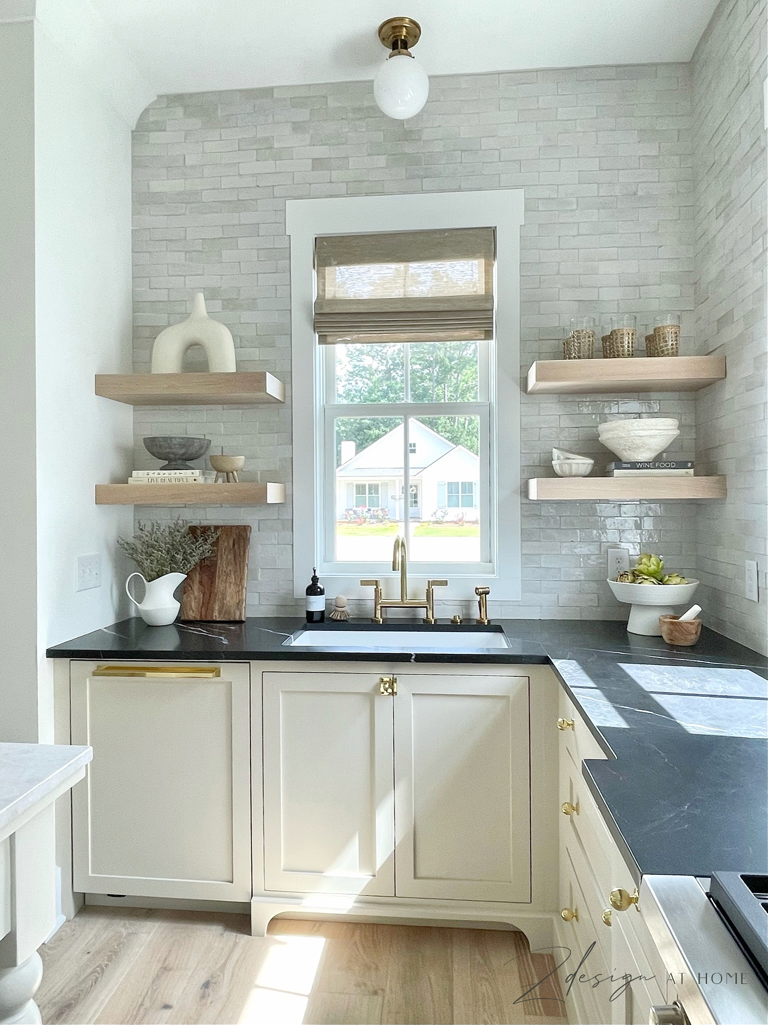 english kitchen with zellige tile backsplash and open white oak shelves, unlacquered brass faucet