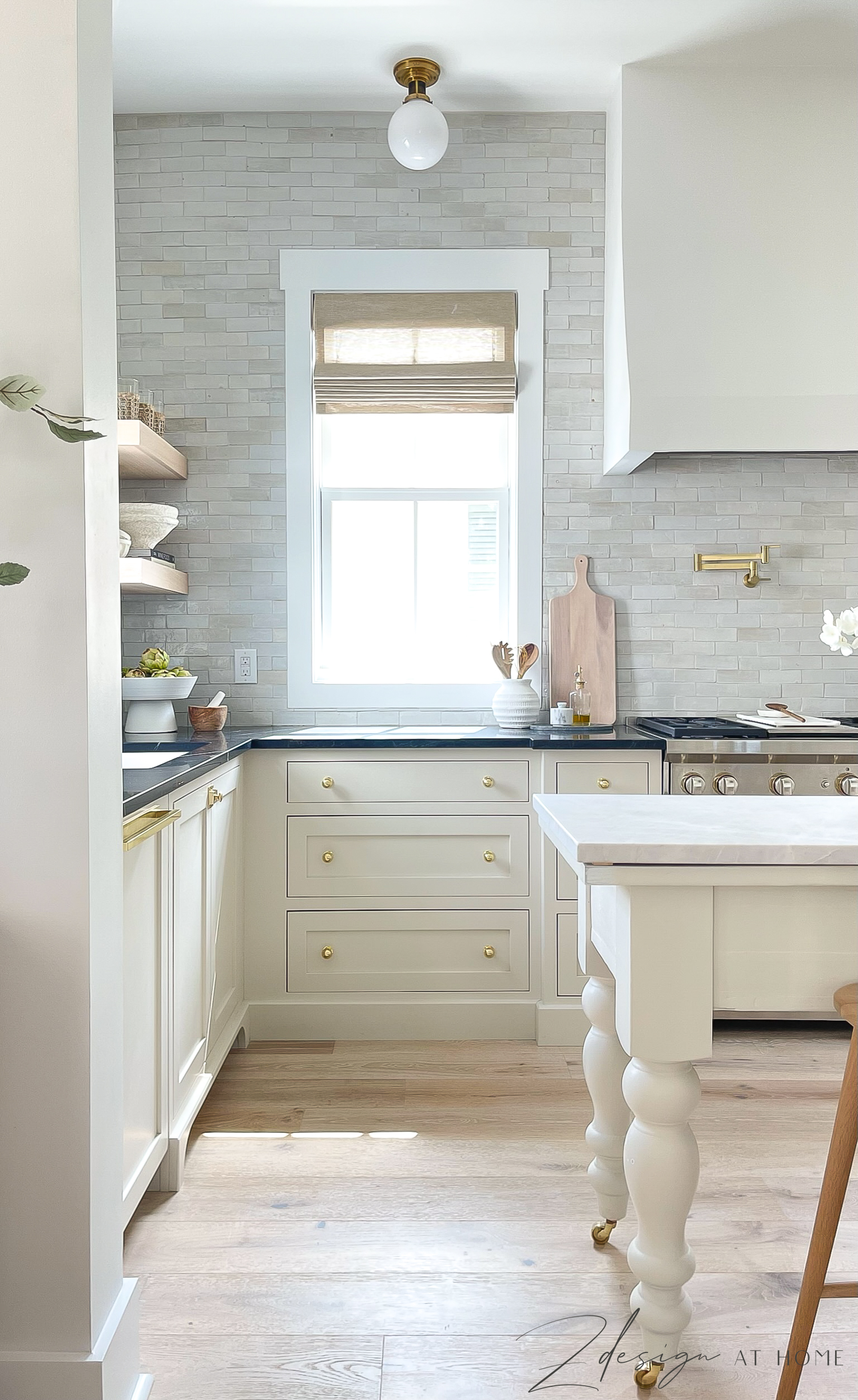 english cottage kitchen with zellige tile backsplash and benjamin more natural cream cabinets. Armac martin cabinet brass hardware 