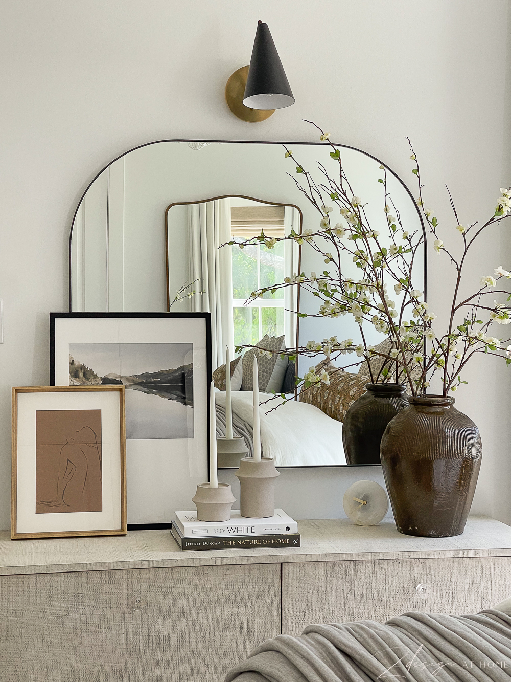 mirror reflects and bedroom dresser styling 